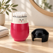 Kokeshi-Dose in Fuchsia mit Wattestäbchen und abgenommenem Deckel – gestaltetes Anwendungsbeispiel